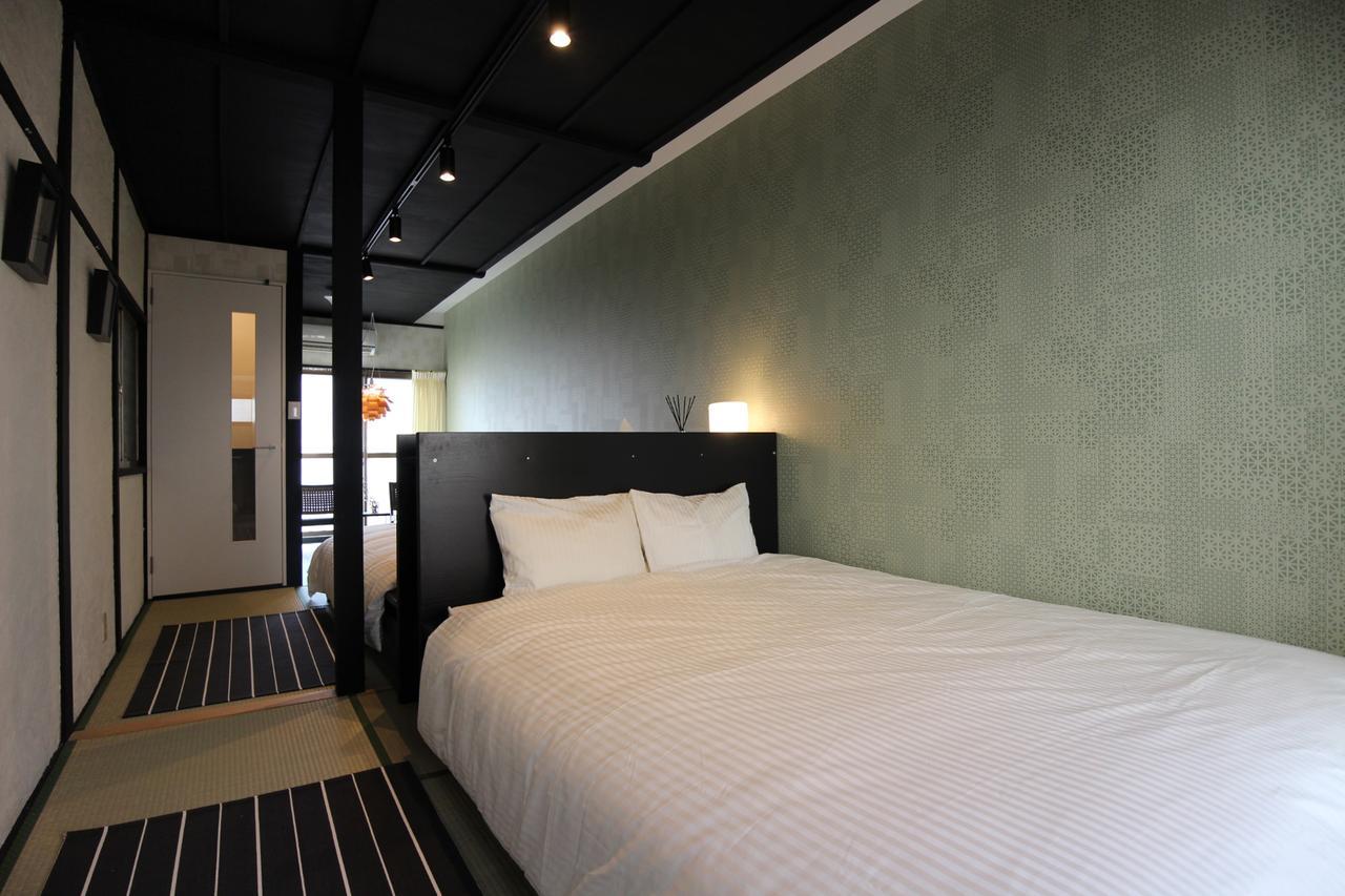 Sekai Hotel Tsuki Osaka Esterno foto